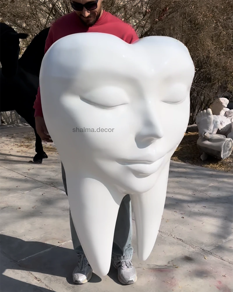 دیوارکوب چهره دندان